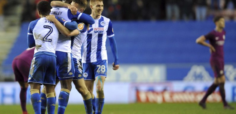 League One side Wigan Athletic knock Manchester City out of the FA Cup